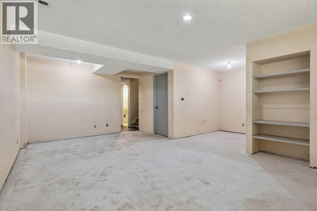 130 Woodbrook Way SW, Calgary, Alberta  T2W 4R6 - Photo 23 - A2321860