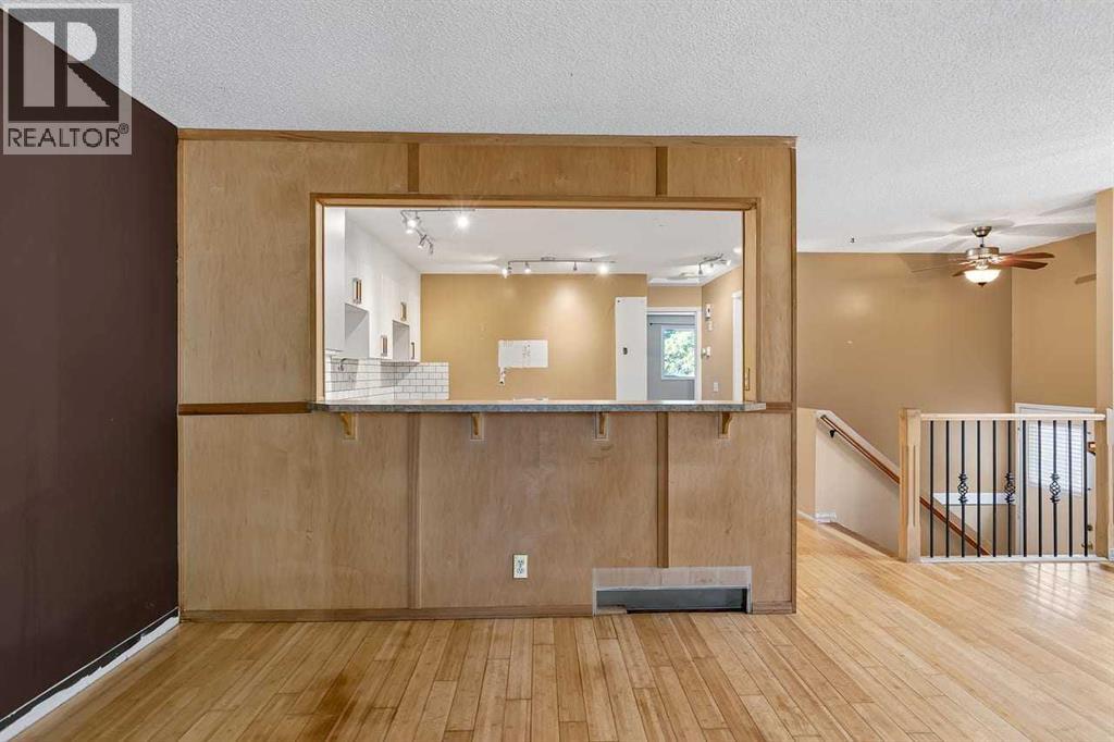 130 Woodbrook Way SW, Calgary, Alberta  T2W 4R6 - Photo 7 - A2321860