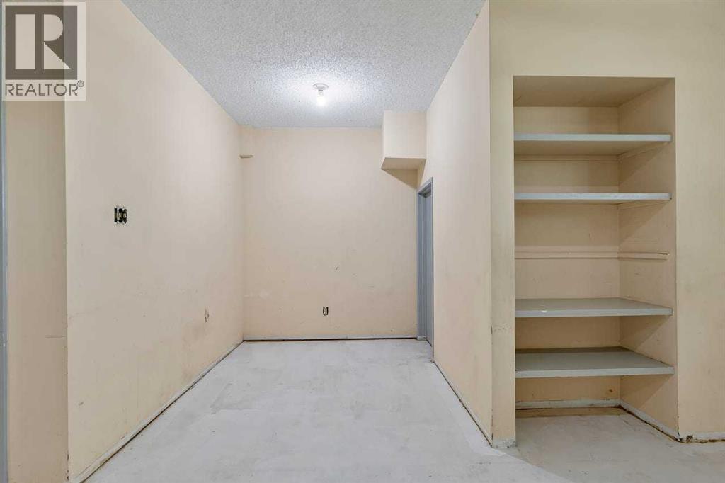 130 Woodbrook Way SW, Calgary, Alberta  T2W 4R6 - Photo 24 - A2321860