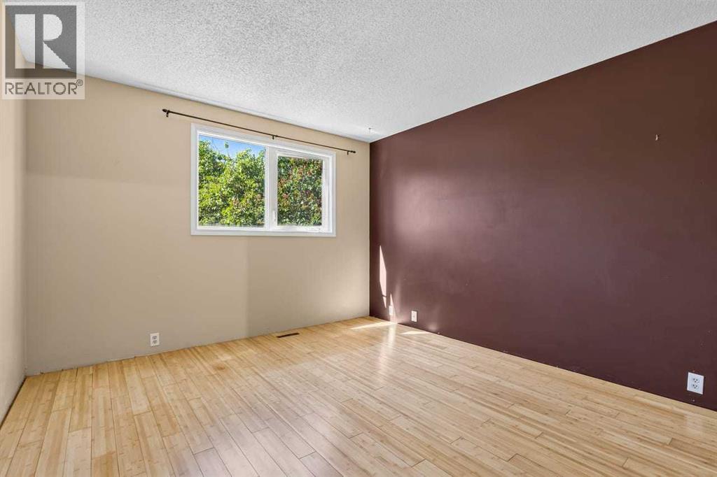 130 Woodbrook Way SW, Calgary, Alberta  T2W 4R6 - Photo 18 - A2321860