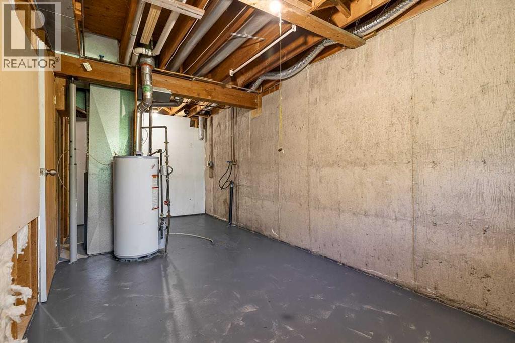 130 Woodbrook Way SW, Calgary, Alberta  T2W 4R6 - Photo 30 - A2321860