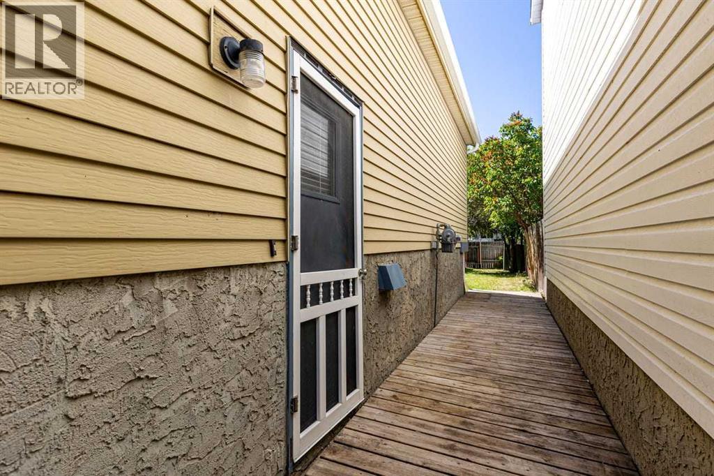 130 Woodbrook Way SW, Calgary, Alberta  T2W 4R6 - Photo 37 - A2321860