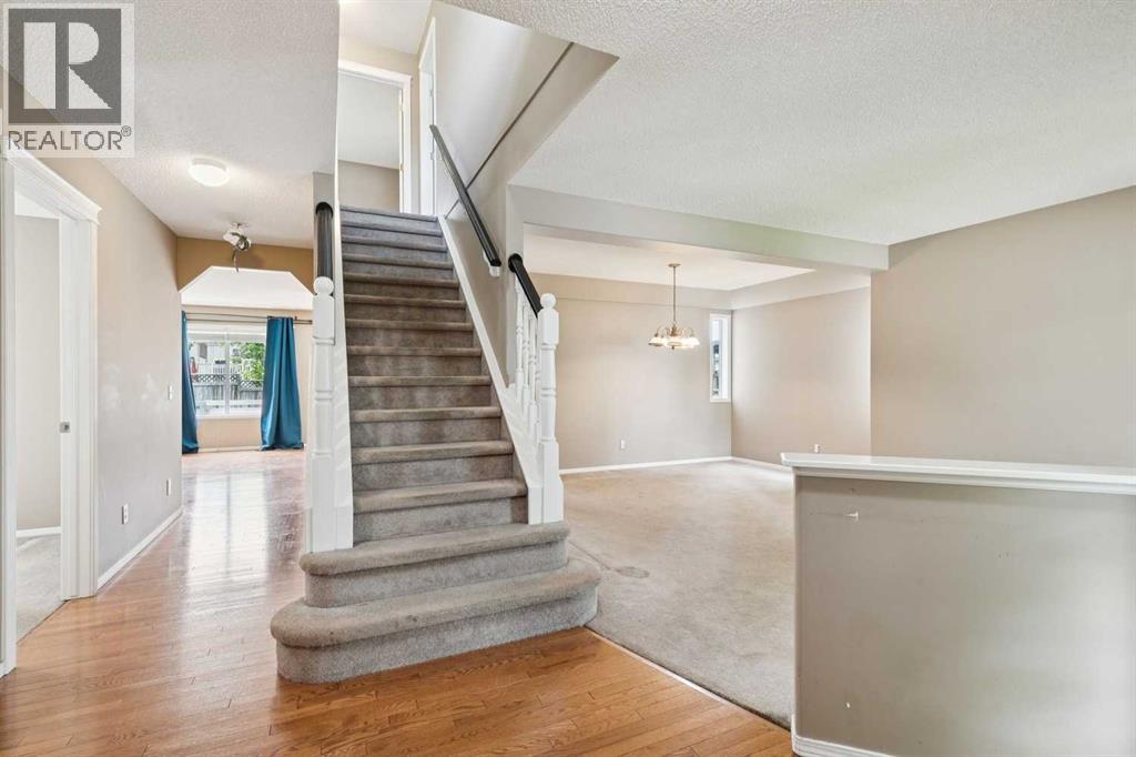 36 Valley Stream Close NW, Calgary, Alberta  T3B 5V7 - Photo 3 - A2323534