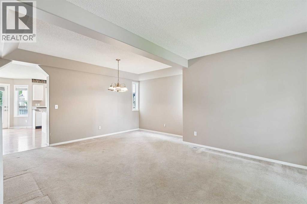 36 Valley Stream Close NW, Calgary, Alberta  T3B 5V7 - Photo 5 - A2323534