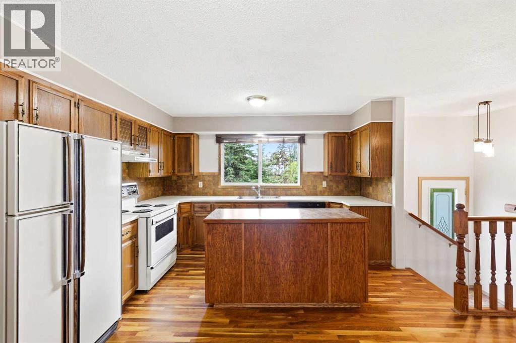 1251 Hunterquay Hill Nw, Calgary, Alberta  T2K 4T3 - Photo 11 - A2322995