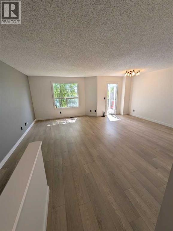 242 Taracove Place Ne, Calgary, Alberta  T3J 4T4 - Photo 5 - A2323595