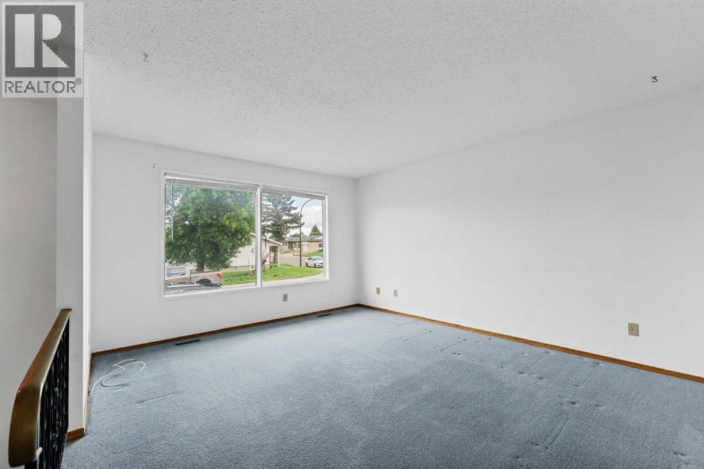 13 Rossland Place Se, Medicine Hat, Alberta  T1B 1Z8 - Photo 9 - A2323649