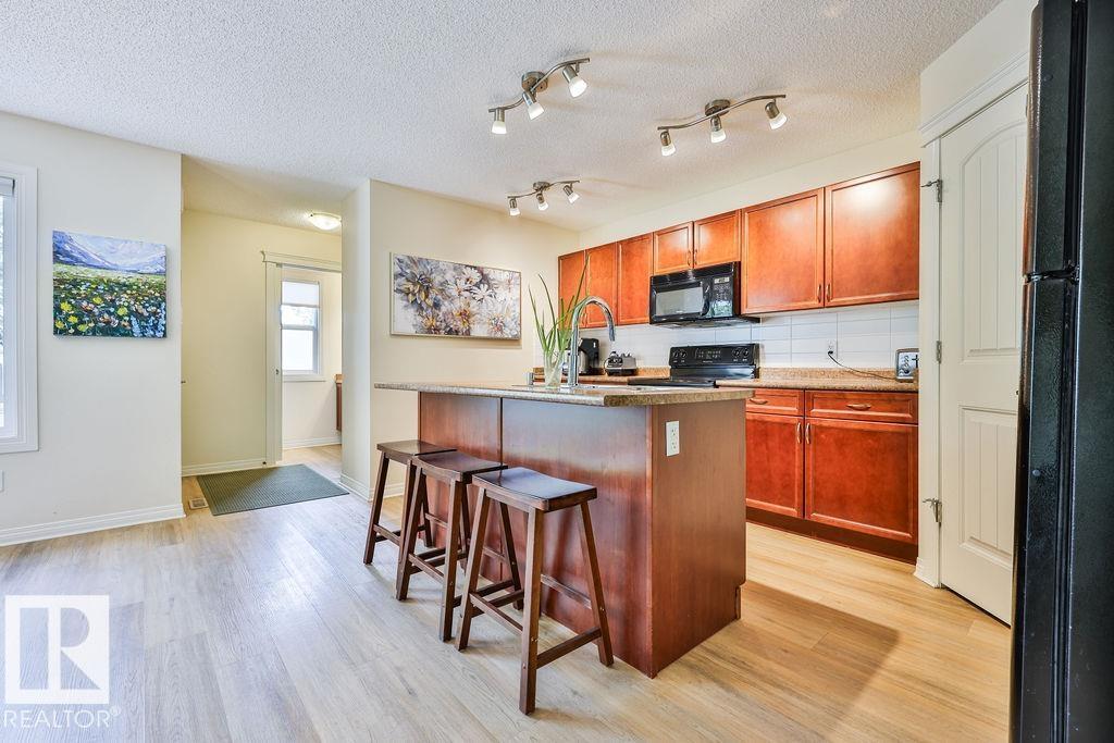 8760 Stein Ln NW, Edmonton, Alberta  T6R 0L5 - Photo 4 - E4495391
