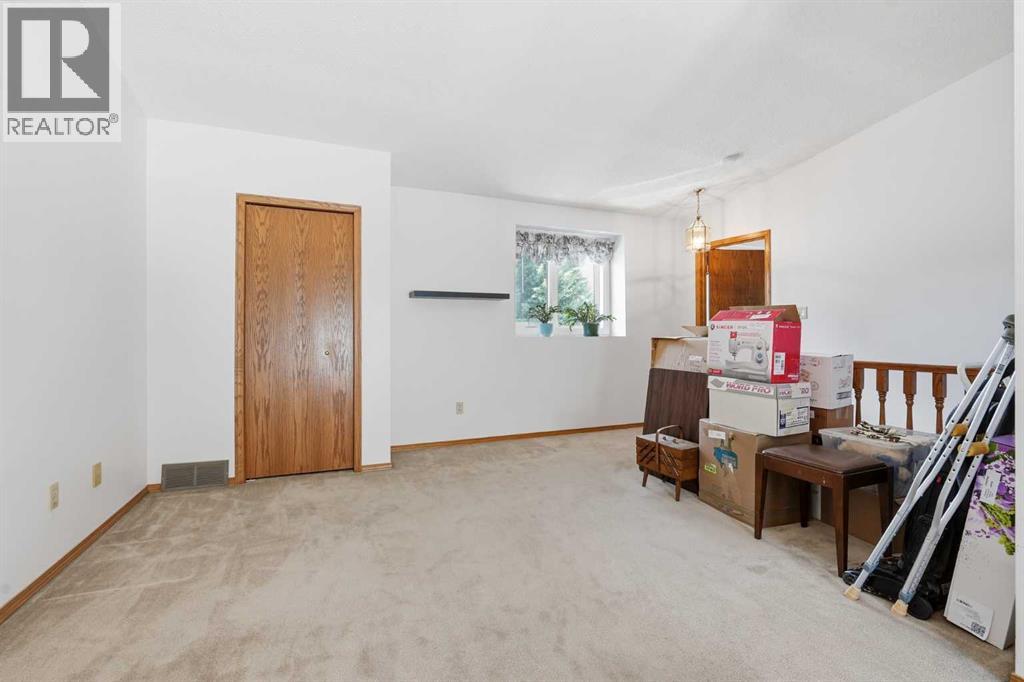 22a Woodmeadow Close Sw, Calgary, Alberta  T2W 4L8 - Photo 30 - A2317102