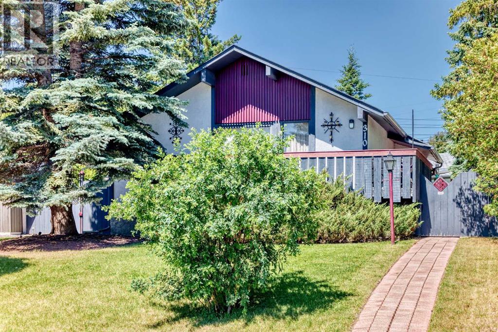 310 Huntham Place Ne, Calgary, Alberta  T2K 4G7 - Photo 1 - A2322466