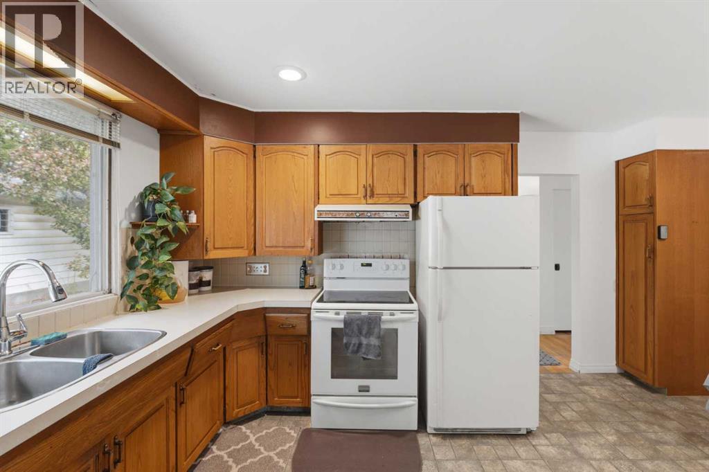 3248 Bearspaw Drive NW, Calgary, Alberta  T2L 1T3 - Photo 10 - A2322391