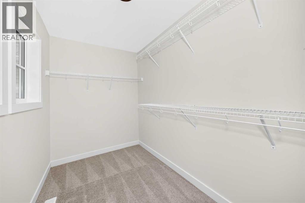18 Tillotson Downs, Okotoks, Alberta  T1S 4Z5 - Photo 30 - A2321221
