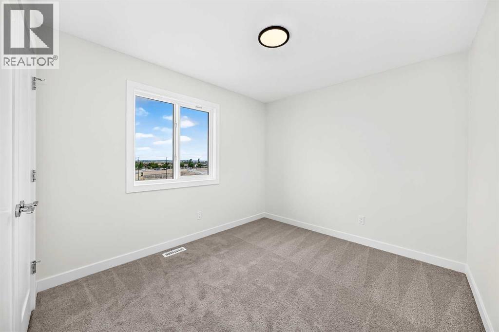 18 Tillotson Downs, Okotoks, Alberta  T1S 4Z5 - Photo 32 - A2321221