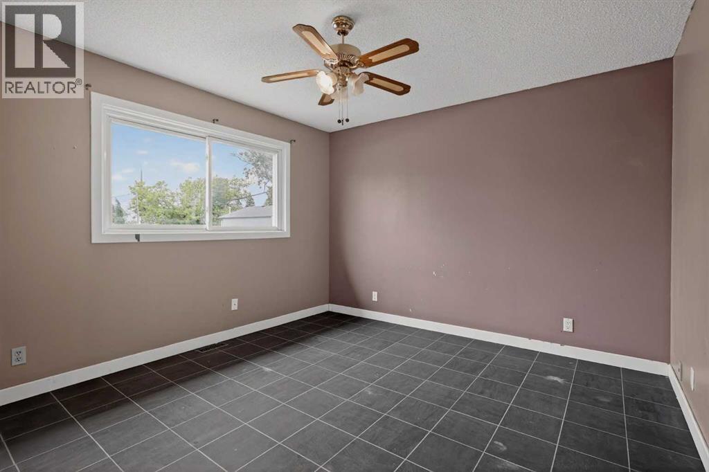 504 1 Avenue Ne, Airdrie, Alberta  T4B 1R1 - Photo 13 - A2318619