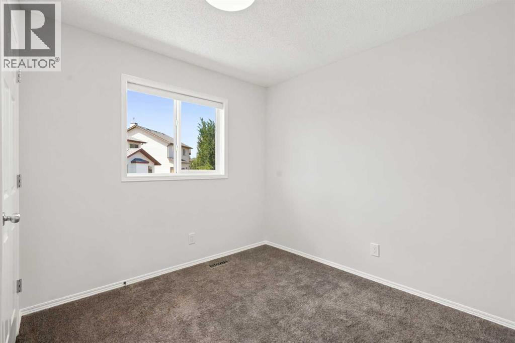 55 New Brighton Drive SE, Calgary, Alberta  T2Z 4B2 - Photo 31 - A2323545
