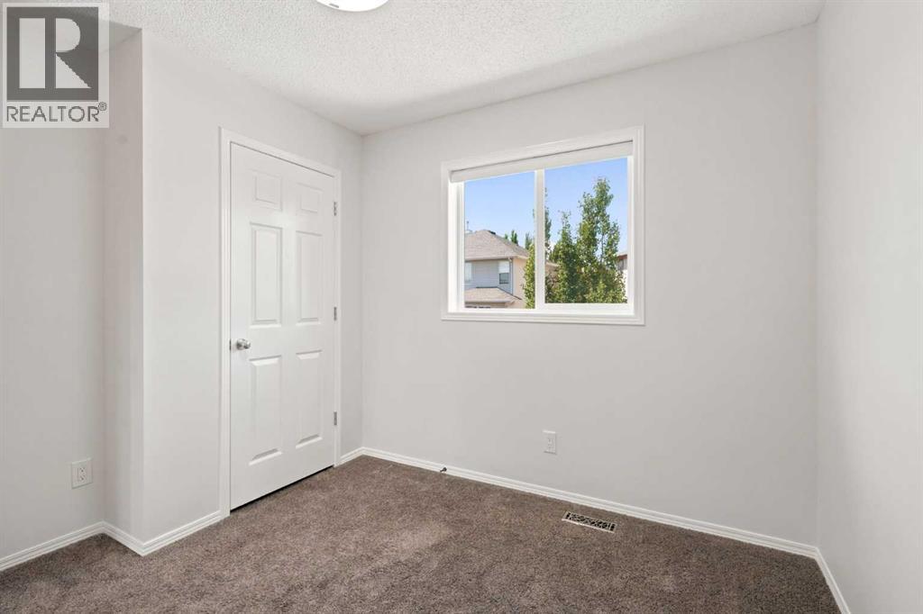 55 New Brighton Drive SE, Calgary, Alberta  T2Z 4B2 - Photo 40 - A2323545