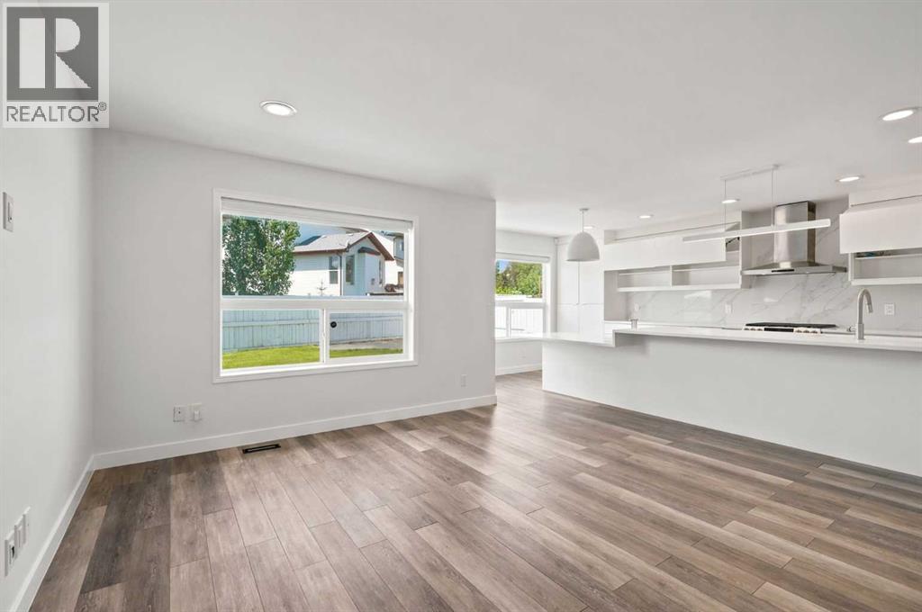 55 New Brighton Drive SE, Calgary, Alberta  T2Z 4B2 - Photo 6 - A2323545