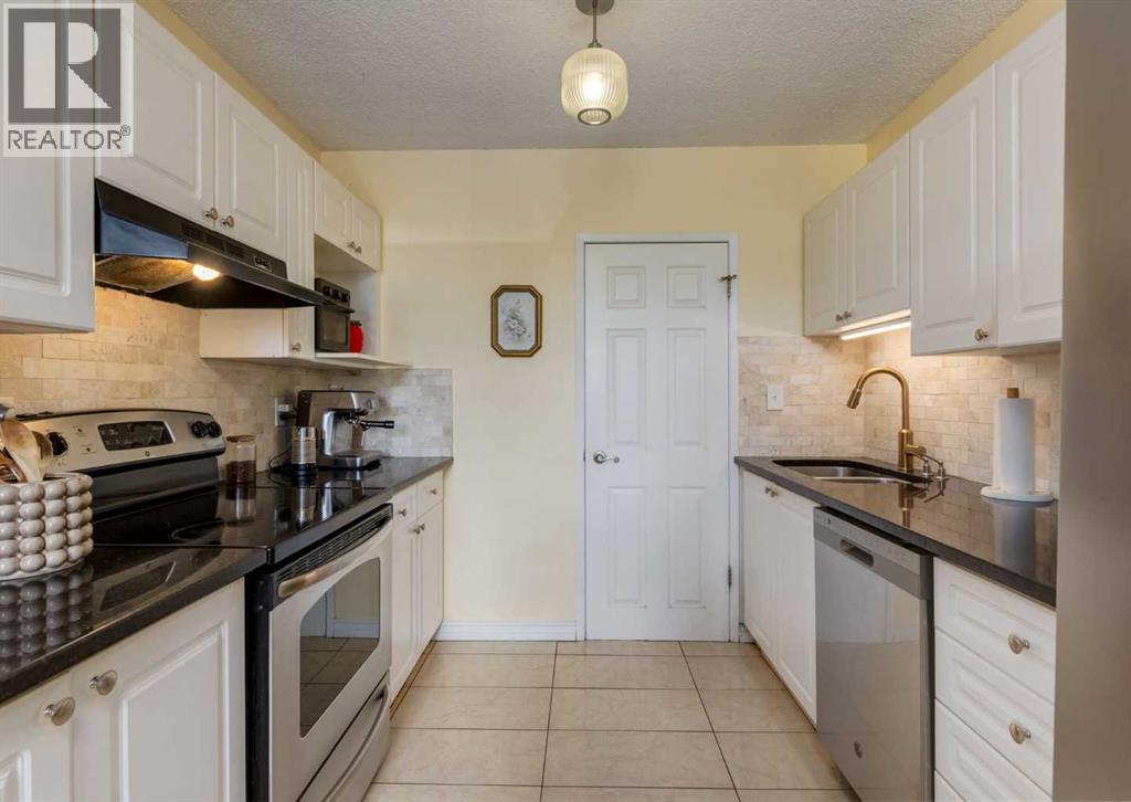 213, 7007 4a Street SW, Calgary, Alberta  T2V 1A1 - Photo 4 - A2323861