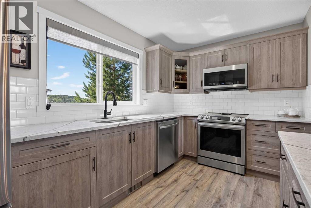 124 Sunvalley Road, Cochrane, Alberta  T4C 0X8 - Photo 16 - A2324126