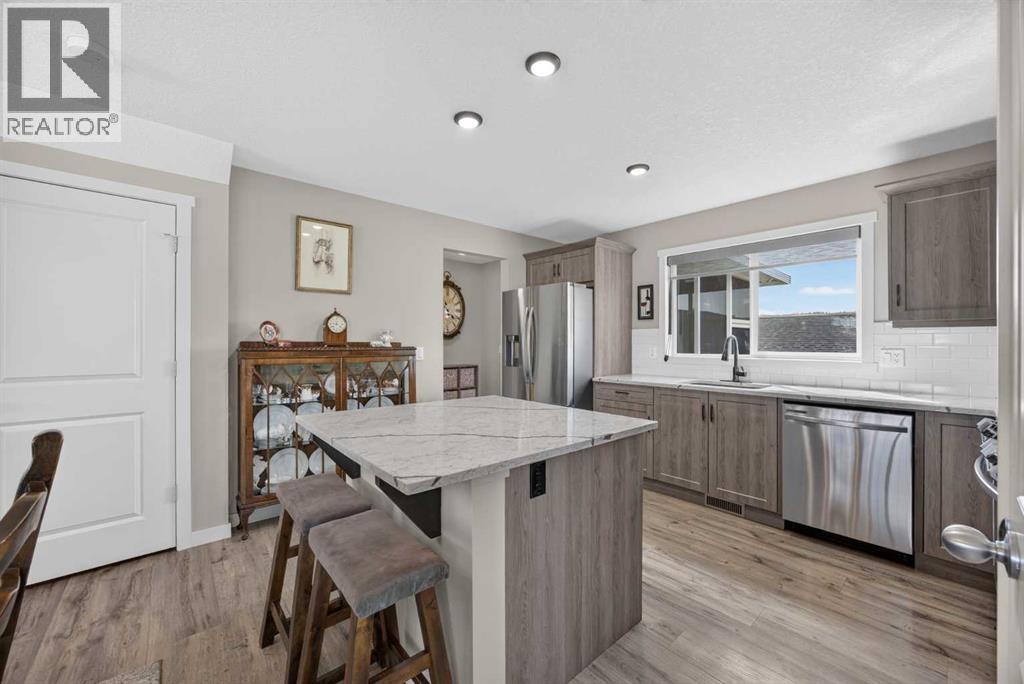 124 Sunvalley Road, Cochrane, Alberta  T4C 0X8 - Photo 18 - A2324126