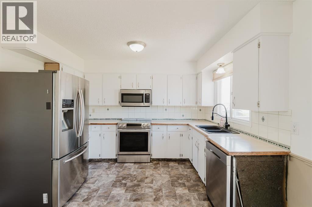 9101 100 Avenue, Sexsmith, Alberta  T0H 3C0 - Photo 11 - A2323782