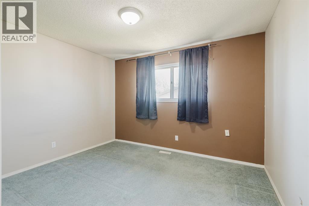 9101 100 Avenue, Sexsmith, Alberta  T0H 3C0 - Photo 14 - A2323782