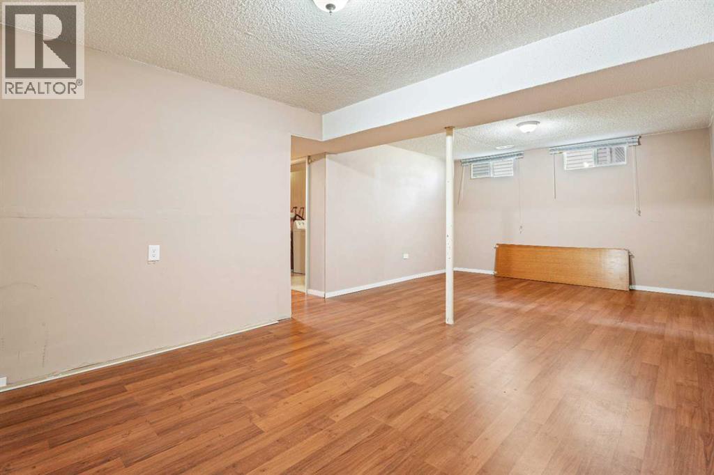 77 Winslow Crescent Sw, Calgary, Alberta  T3C 2R3 - Photo 29 - A2324142