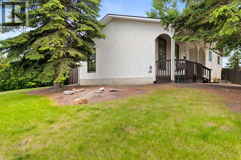 6756 Huntchester Road Ne, Calgary, Alberta  T2K 5E7 - Photo 4 - A2323997