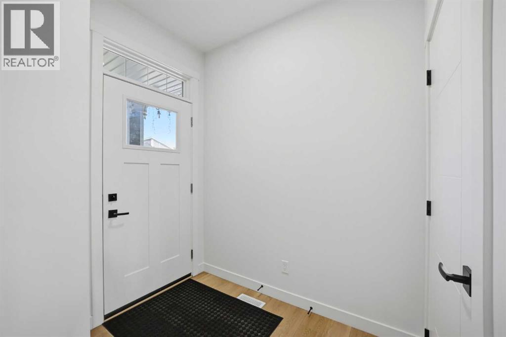 332 Belmont Park Sw, Calgary, Alberta  T2X 5T1 - Photo 7 - A2323858