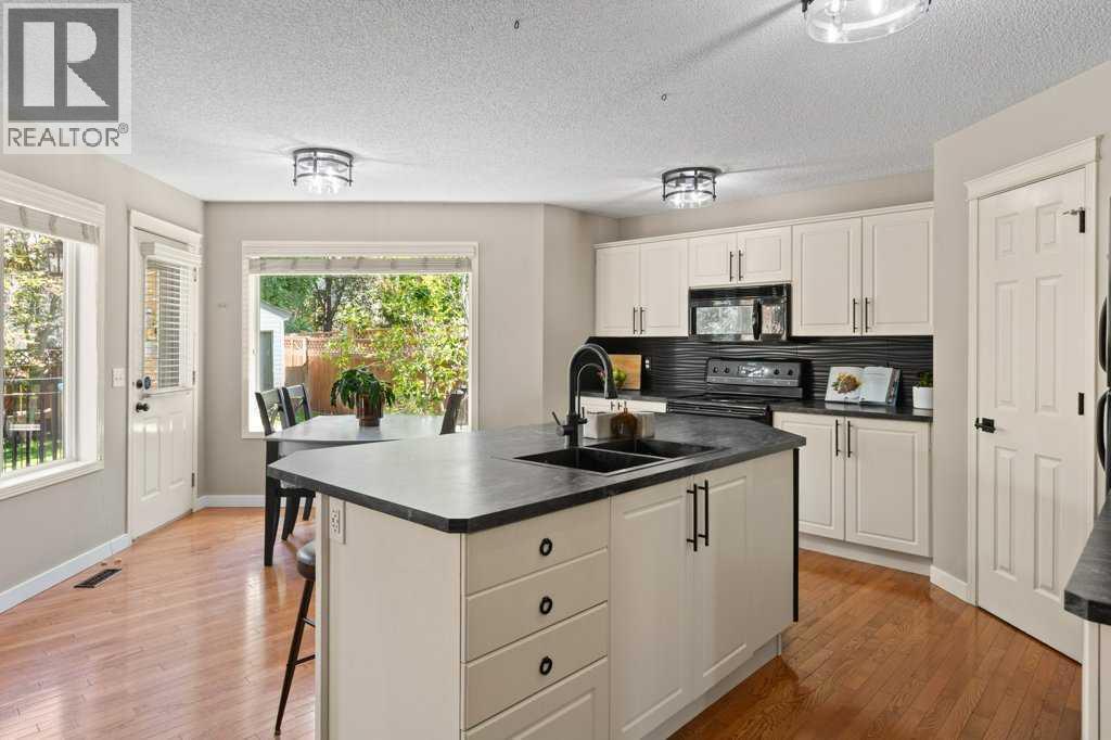 15 Valley Stream Circle Nw, Calgary, Alberta  T3B 5V9 - Photo 6 - A2322674