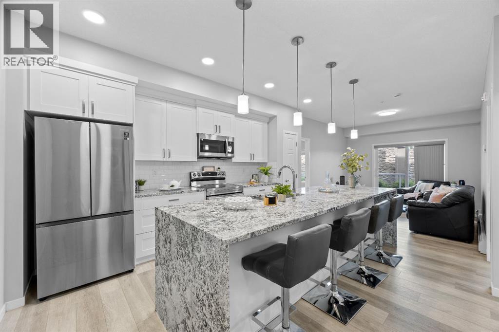 105, 200 Harvest Hills Place Ne, Calgary, Alberta  T3K 2N3 - Photo 1 - A2322999