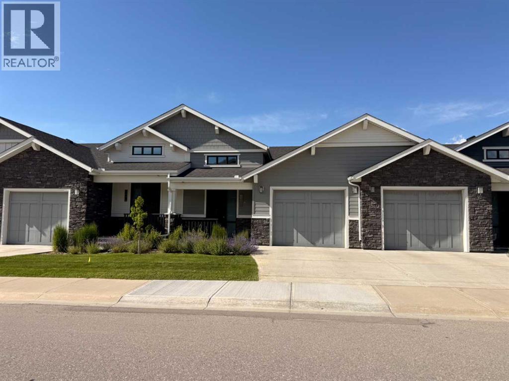 12572 Crestmont Boulevard SW, Calgary, Alberta  T3B 6J5 - Photo 1 - A2313979