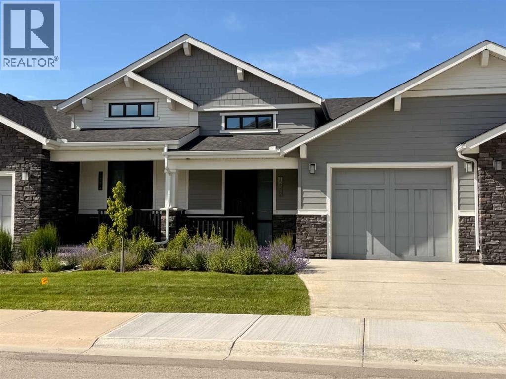 12572 Crestmont Boulevard SW, Calgary, Alberta  T3B 6J5 - Photo 2 - A2313979