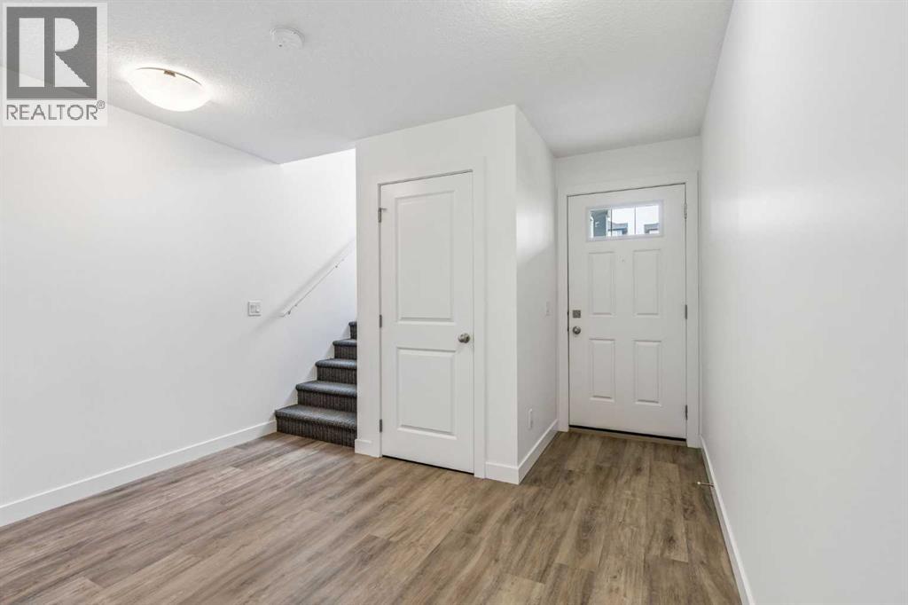 1002, 24 Rivercrest Drive, Cochrane, Alberta  T4C 2C8 - Photo 3 - A2323907