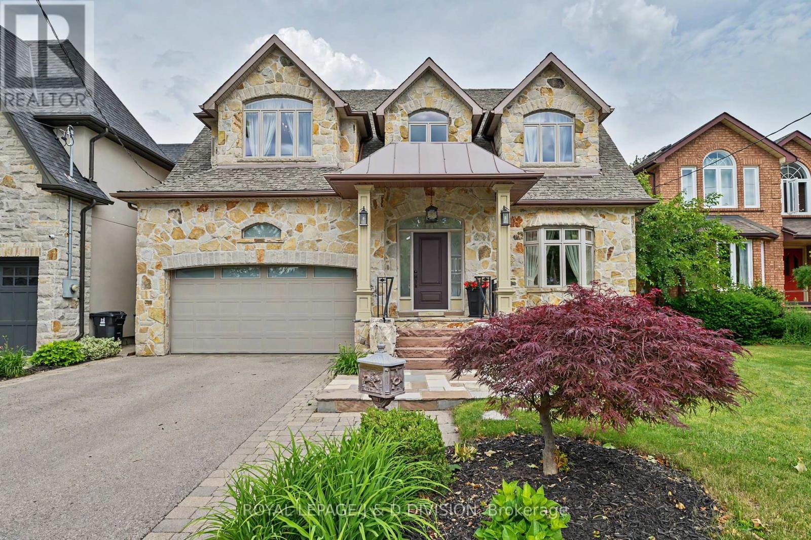 <div class="slider-price">$2,495,000</div><p>17 Agar Crescent, Toronto, Ontario</p>