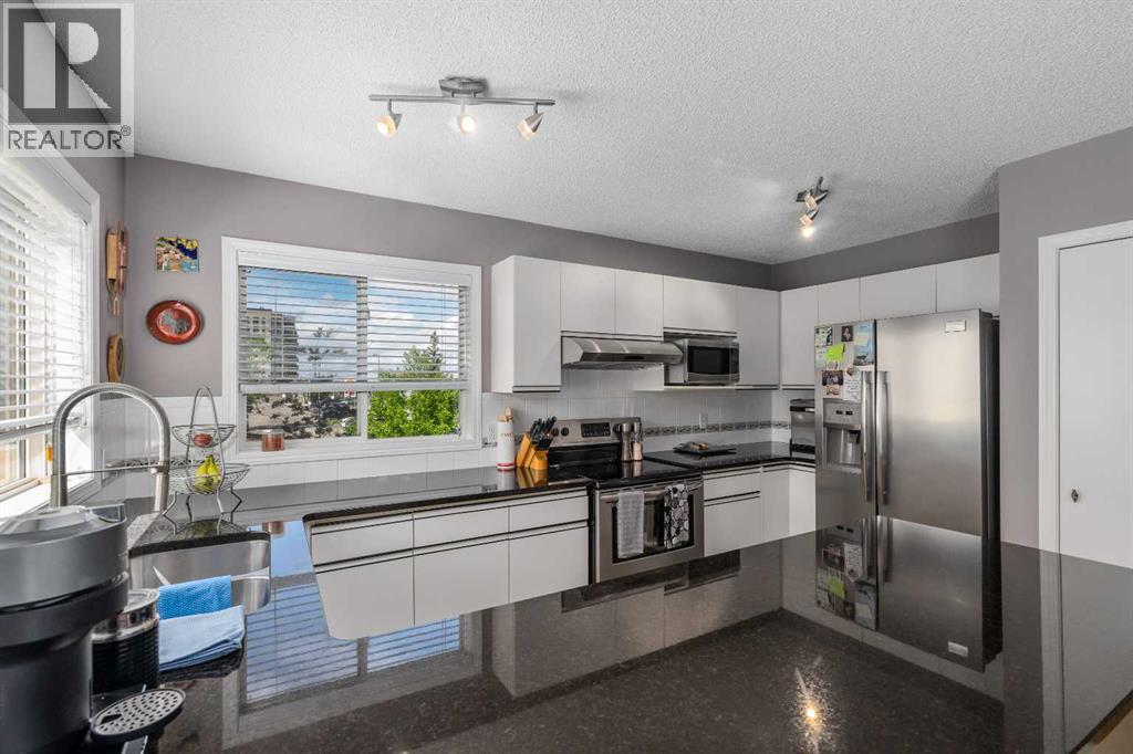 47 Millrose Place SW, Calgary, Alberta  T2Y 3J6 - Photo 6 - A2323714