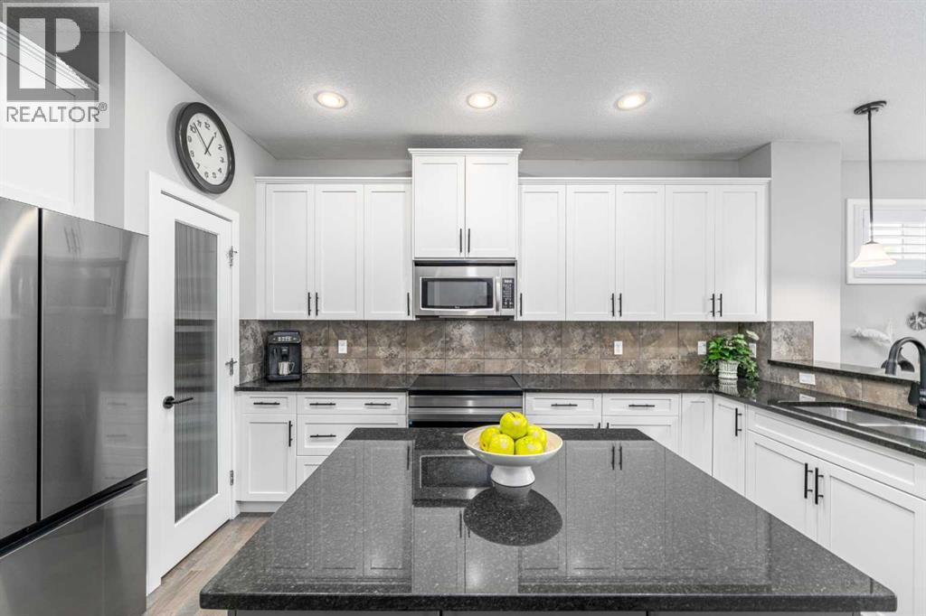 141 Copperpond Bay SE, Calgary, Alberta  T2Z 0R2 - Photo 8 - A2323913