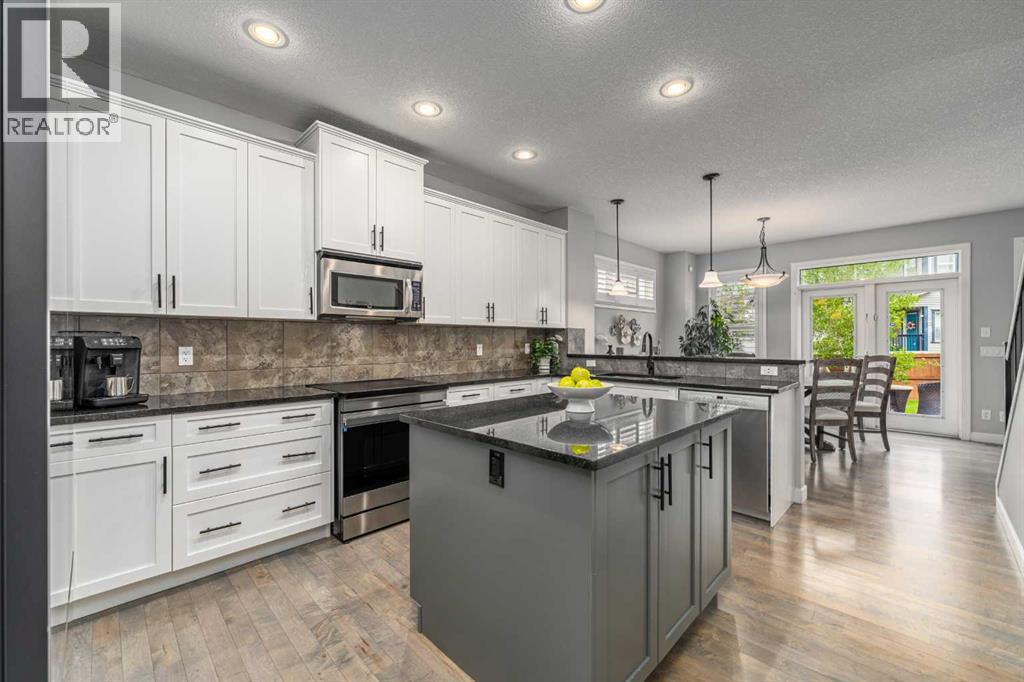 141 Copperpond Bay SE, Calgary, Alberta  T2Z 0R2 - Photo 6 - A2323913