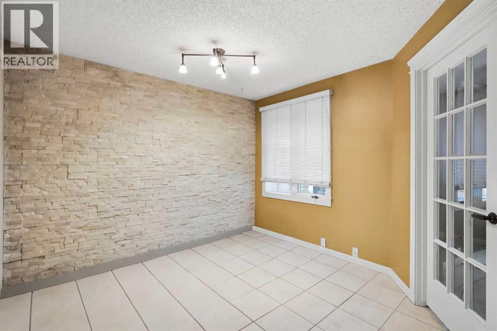 16 Wood Crescent Sw, Calgary, Alberta  T2W 4B6 - Photo 6 - A2324011