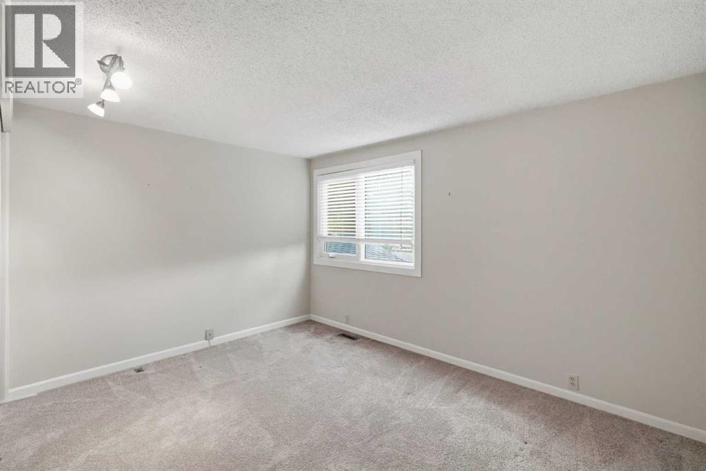 16 Wood Crescent Sw, Calgary, Alberta  T2W 4B6 - Photo 27 - A2324011
