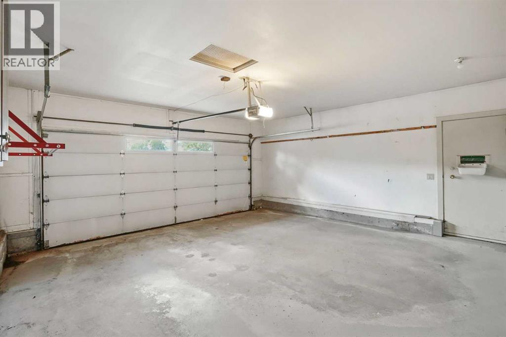 16 Wood Crescent Sw, Calgary, Alberta  T2W 4B6 - Photo 35 - A2324011