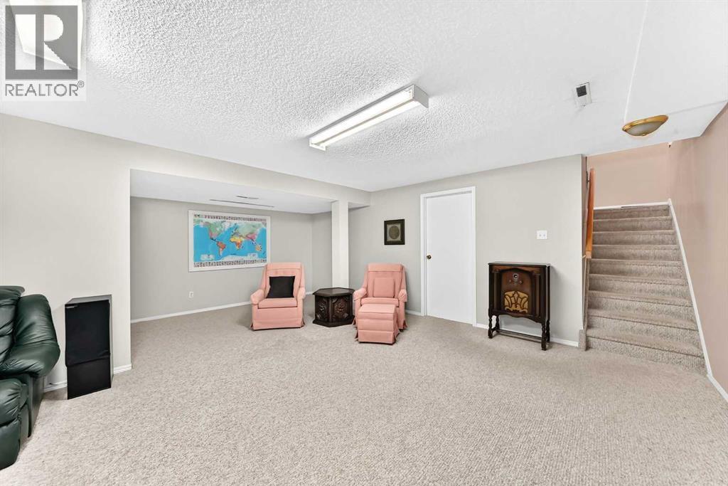 10435 Mapleridge Crescent Se, Calgary, Alberta  T2J 1Y8 - Photo 31 - A2322834