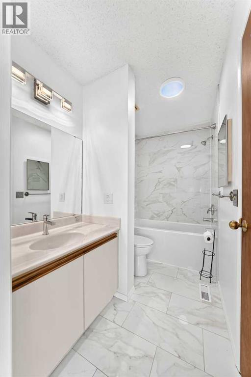 18 Erin Ridge Court Se, Calgary, Alberta  T2B 3B2 - Photo 9 - A2324073