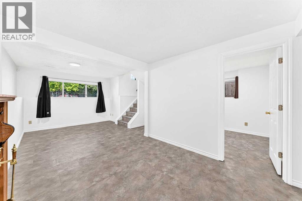 18 Erin Ridge Court Se, Calgary, Alberta  T2B 3B2 - Photo 23 - A2324073