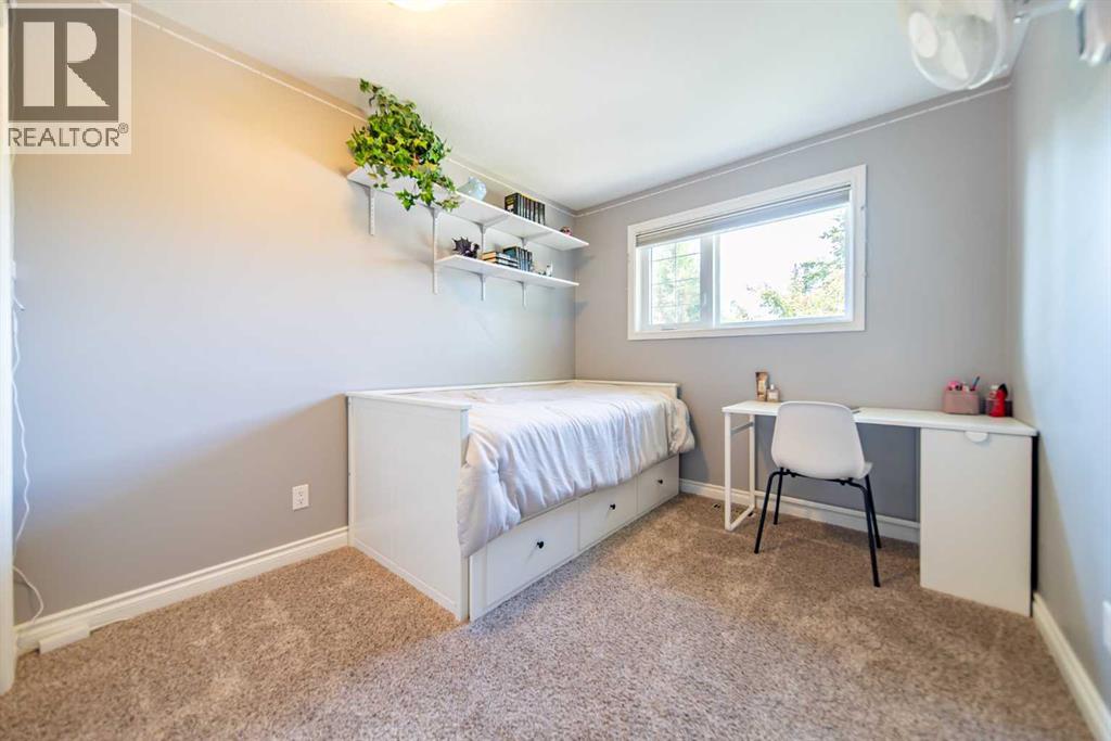 310 Silver Ridge Crescent Nw, Calgary, Alberta  T3B 3T5 - Photo 20 - A2323286