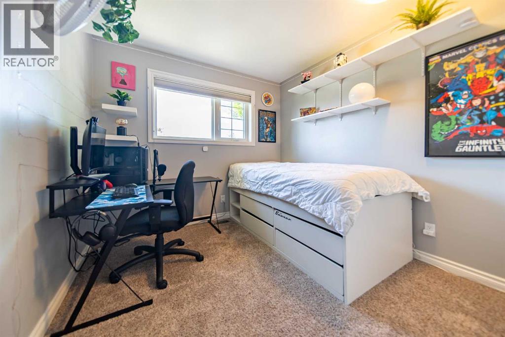 310 Silver Ridge Crescent Nw, Calgary, Alberta  T3B 3T5 - Photo 19 - A2323286