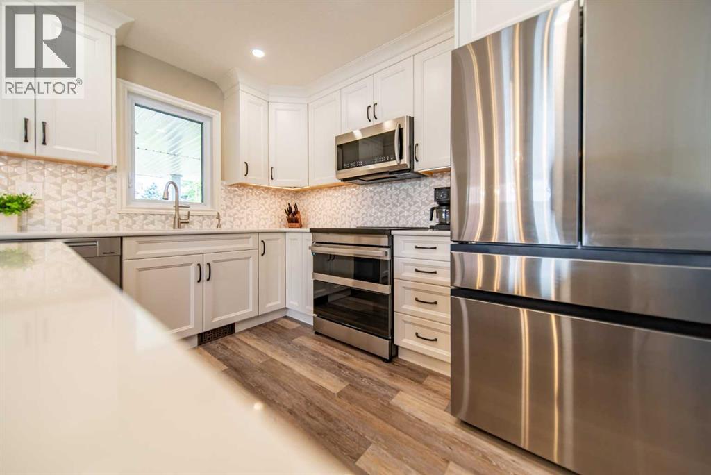 310 Silver Ridge Crescent Nw, Calgary, Alberta  T3B 3T5 - Photo 8 - A2323286