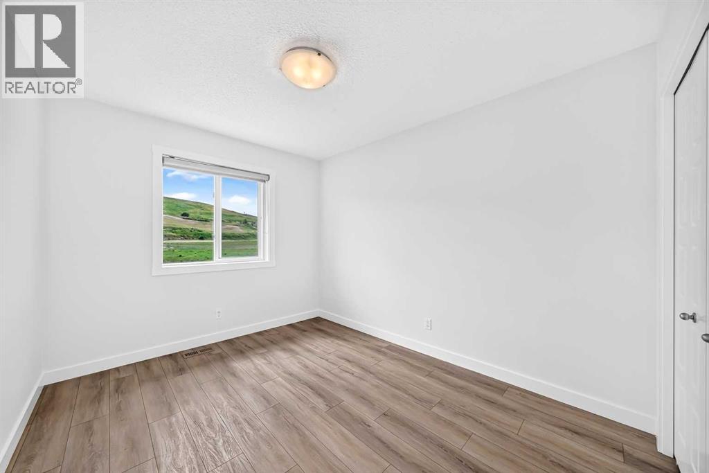 339 Wolf Creek Way SE, Calgary, Alberta  T2X 4Y8 - Photo 18 - A2324786