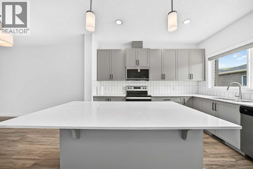 339 Wolf Creek Way SE, Calgary, Alberta  T2X 4Y8 - Photo 4 - A2324786