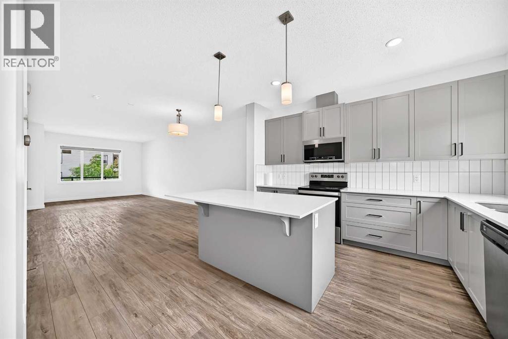 339 Wolf Creek Way SE, Calgary, Alberta  T2X 4Y8 - Photo 5 - A2324786